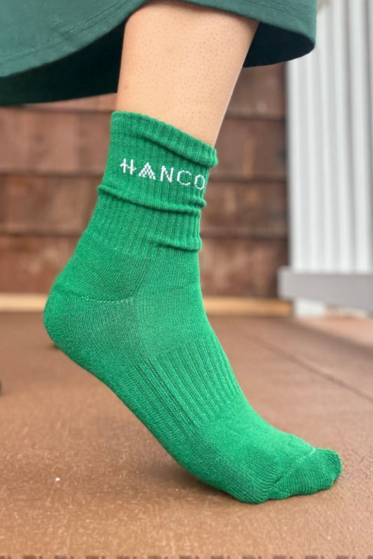 green sock  wooden background